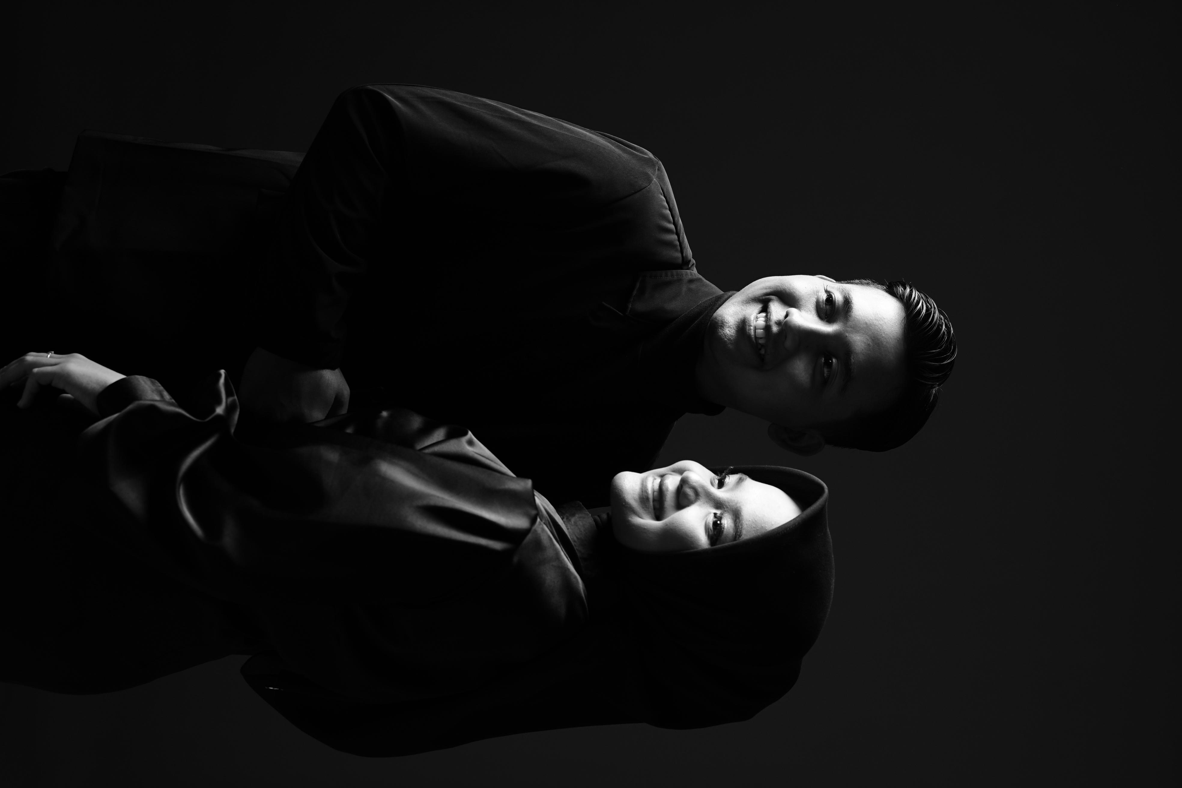 Couple celebrating anniversary with candlelight dinner